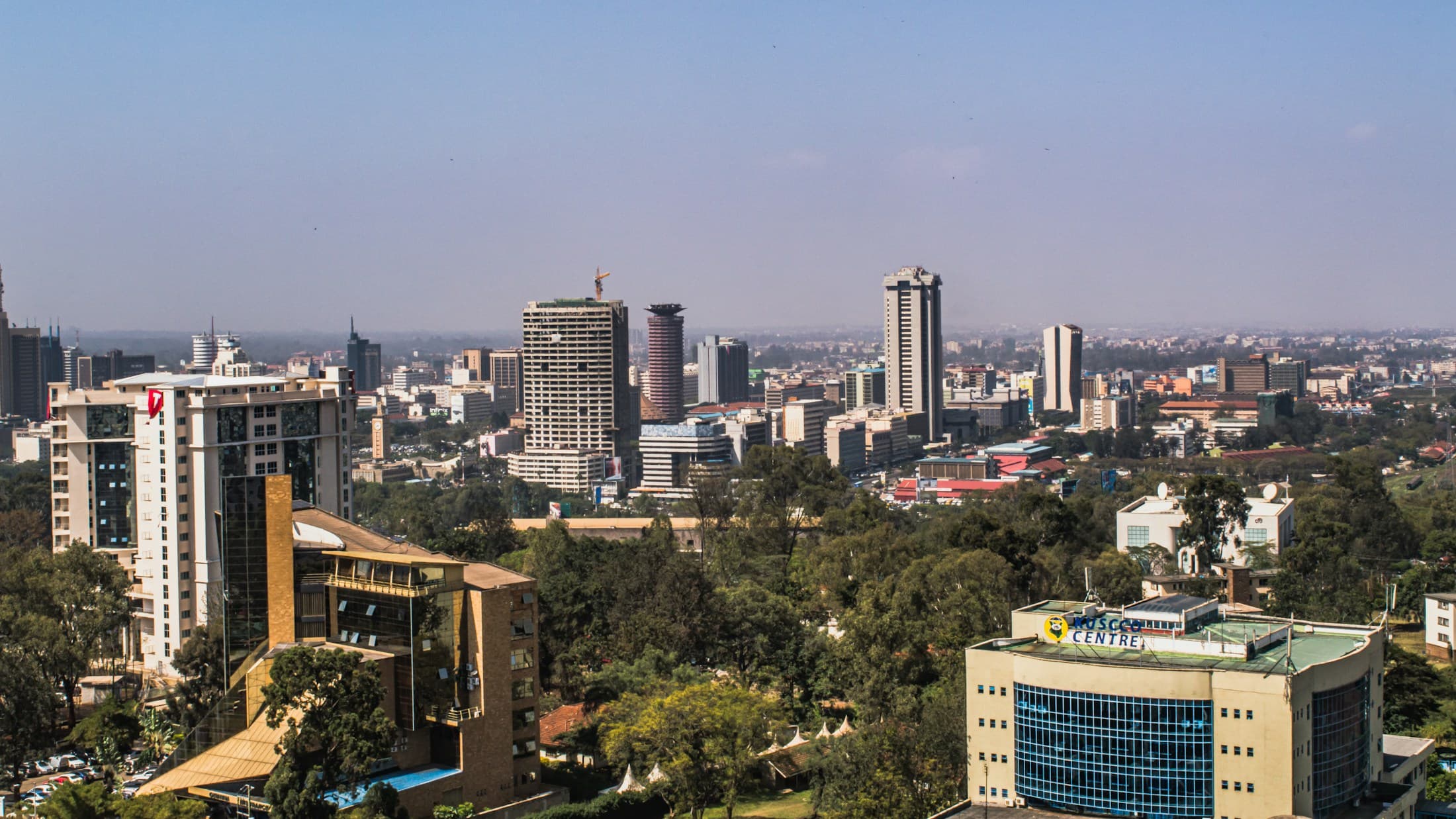 View across Nairobi's skyline with tree-lined streets in the foreground